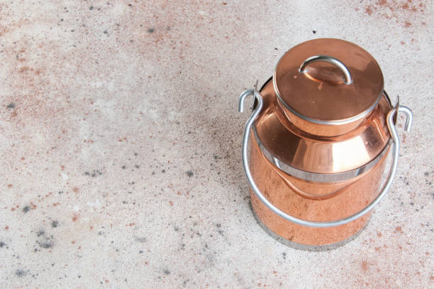 istock Vintage copper milk can 1130571155