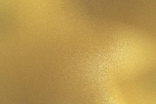 istock Abstract background, reflection rough gold metal texture 1130572658