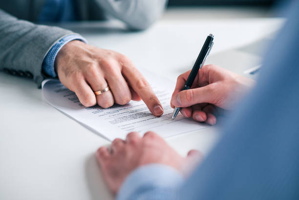 istock Business deal concept. Signing document, close-up. 1130572790