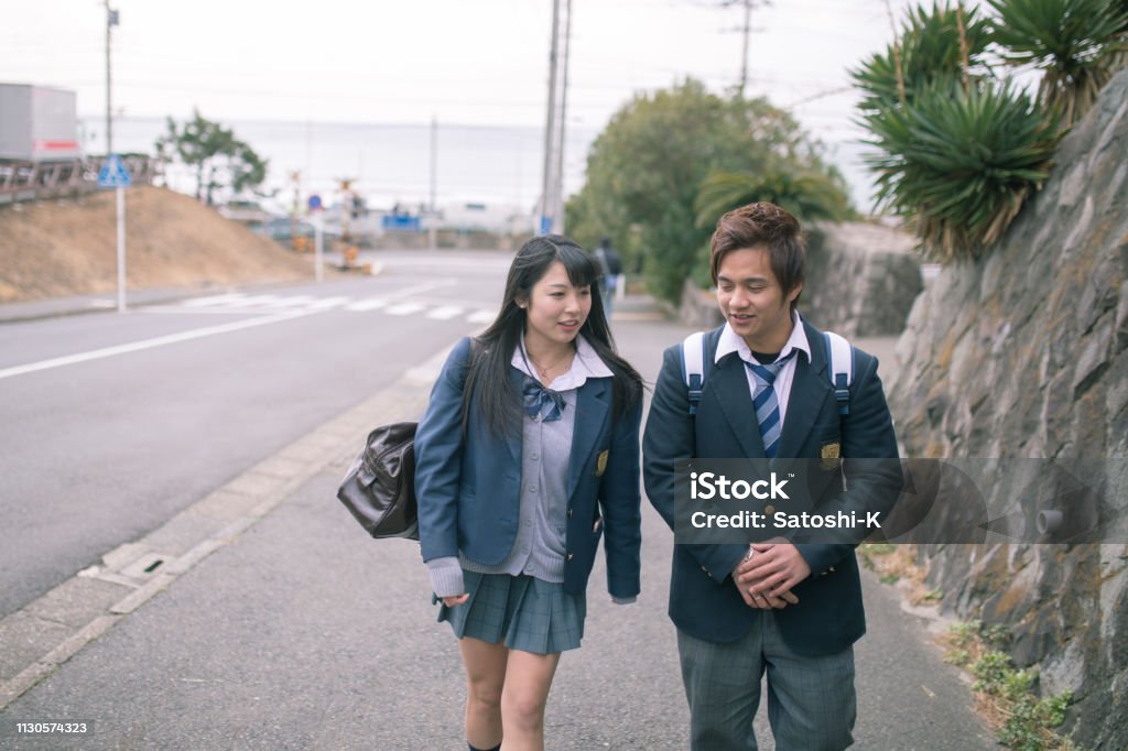High school student couple going to scholl Couple - Relationship Stock Photo