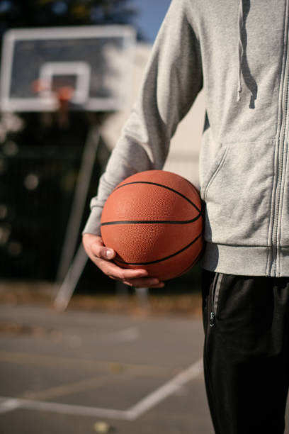 istock Man holds the ball for basketball 1130574407