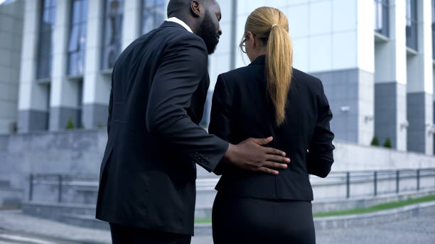 istock Business people reading documents, preparing speech before meeting, back view 1130577173