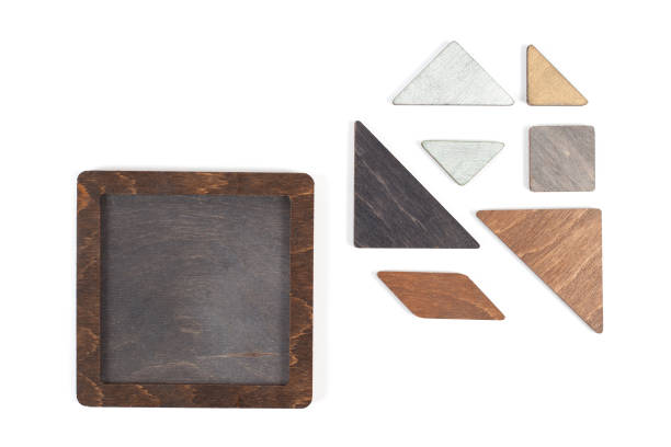 Wooden tangram puzzle in square shape wait for fulfill on white background