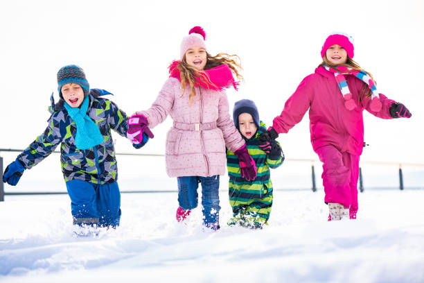 istock Children racing through the snow 1130577550