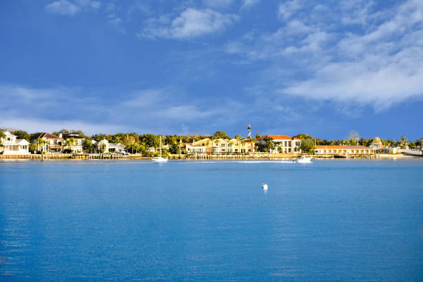 st. augustine, florida. january 26 , 2019. panoramic view of colorful house's, lighthouse and boats on lightblue sky background in florida's historic coast. - orange county california beach imagens e fotografias de stock