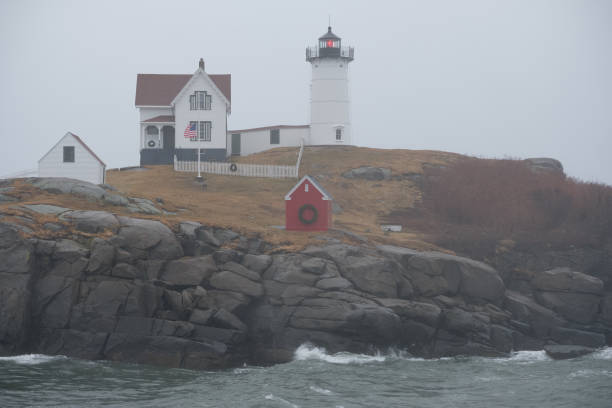 istock Rainstorm and gale force winds at the Nubble Lighthouse on Cape Neddick Maine 1130579991
