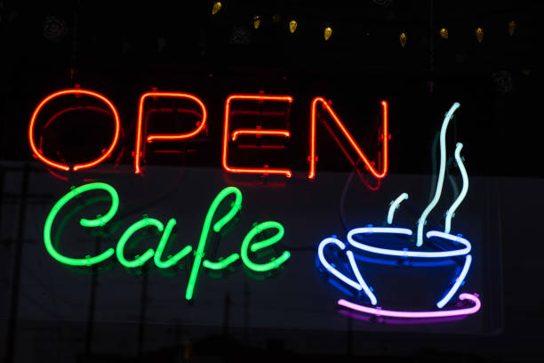 istock illuminated neon sign in cafe coffee shop window coffee cup icon 1130580064