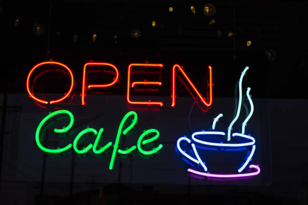 istock illuminated neon sign in cafe coffee shop window coffee cup icon 1130580068