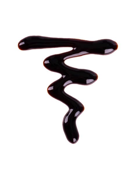 istock Chocolate syrup drop isolated on white background. Top view. 1130580192
