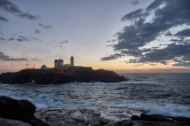 istock Dawn at the Famous Nubble Lighthouse in Cape Neddick Maine 1130580198
