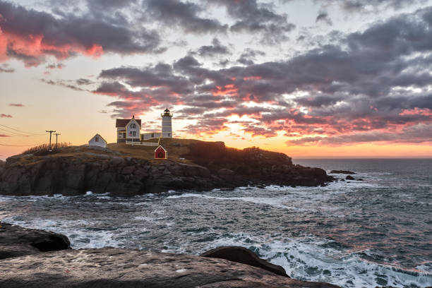 istock Dawn at the Famous Nubble Lighthouse in Cape Neddick Maine 1130580248
