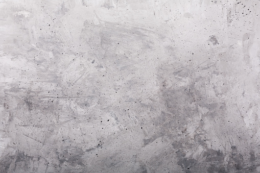 Old gray painted concrete rustic background, horizontal orientation, top view