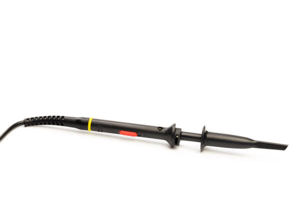 istock oscilloscope probe isolated on white, close up 1130581465
