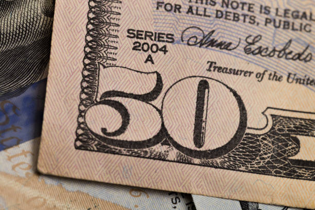 istock fifty Dollars elements , super macro, close up photo 1130584086