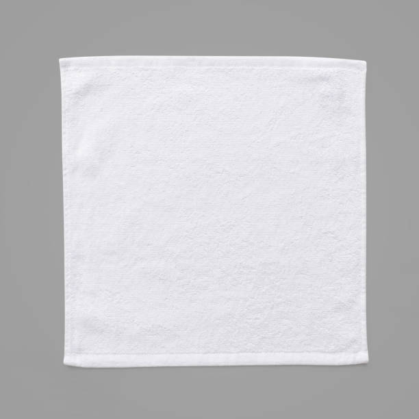 istock White cotton towel mock up template square size fabric wiper isolated on grey background with clipping path, flat lay top view 1130592208