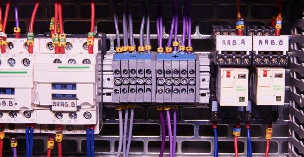 istock Image shows control cubicle. Electric contactors and circuit breakers inside power case 1130599162