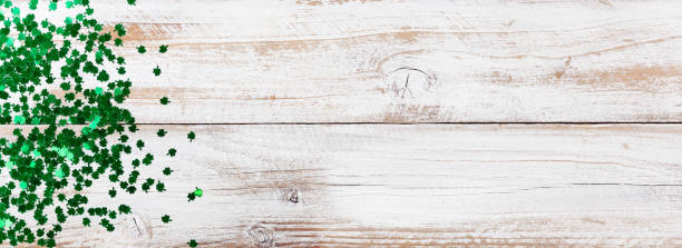 istock Bright green shamrock for Saint Patrick Day on white rustic wood 1130601727