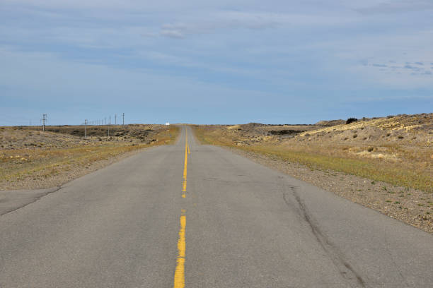 istock asphalt road with hollow among the blue sky view 1130604051