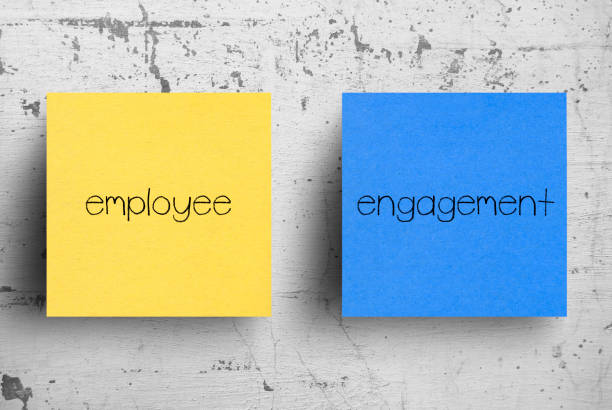 istock Sticky note on concrete wall, Employee Engagement 1130608130