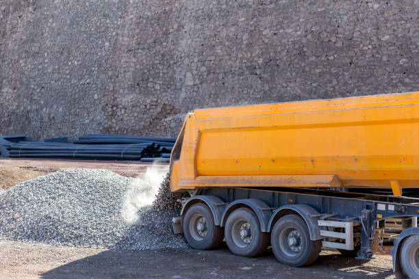 istock The dumper truck is unloading gravels to construction site. 1130609027