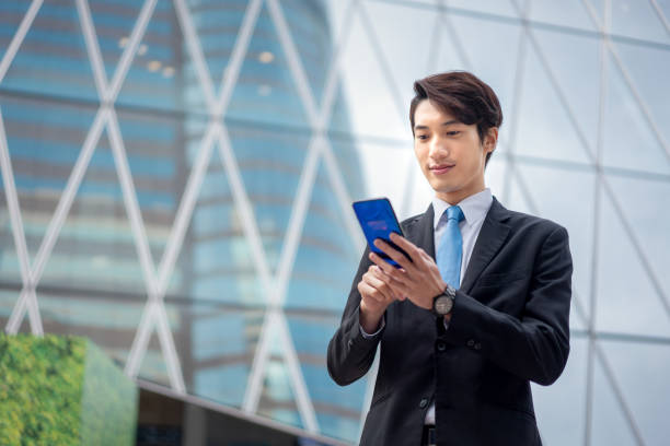 istock Asian businessman using his smartphone 1130610548