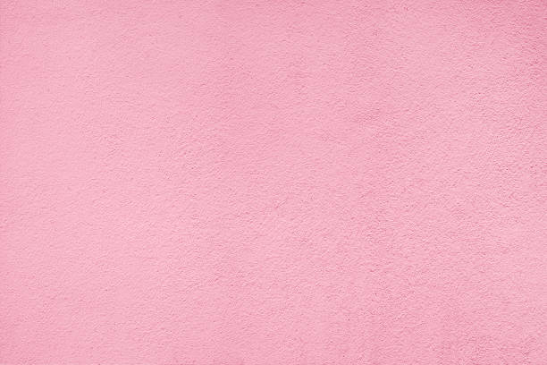 istock Cement wall texture by pink color 1130612619