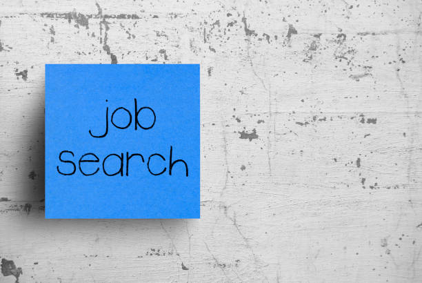 istock Sticky note on concrete wall, Job Search 1130618283