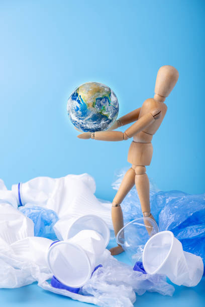 istock Man carry the planet in the hands to save the earth from garbage and plastic. Elements furnished by NASA 1130620818