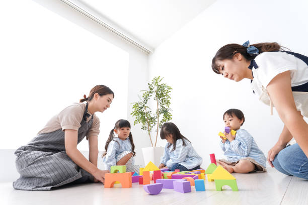 istock Teachers and children at kindergarten 1130622614