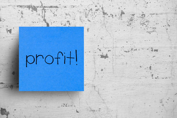istock Sticky note on concrete wall, Profit 1130624317
