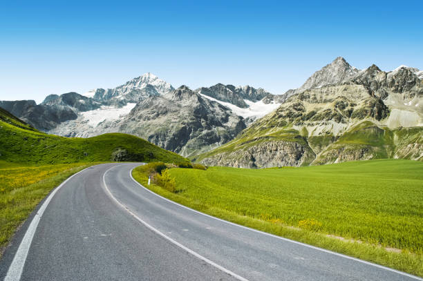 istock Winding mountain road without cars 1130625403
