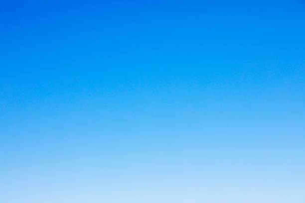 istock Fluffy blue sky background and white clouds soft focus, and copy space 1130630729