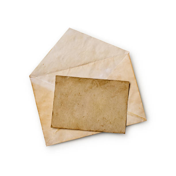 istock Old yellowed paper layout for vintage photo or post card with envelope 1130631894