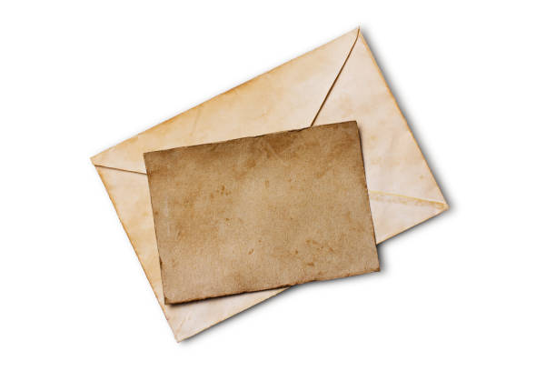 istock Old yellowed paper layout for vintage photo or post card with envelope 1130631912