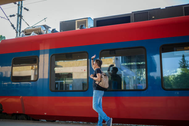 istock Tourist backpacker to travel at train station 1130632457
