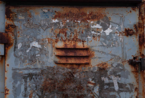 istock old rusty peeled with gray paint and for ventilation iron box close-up 1130632955