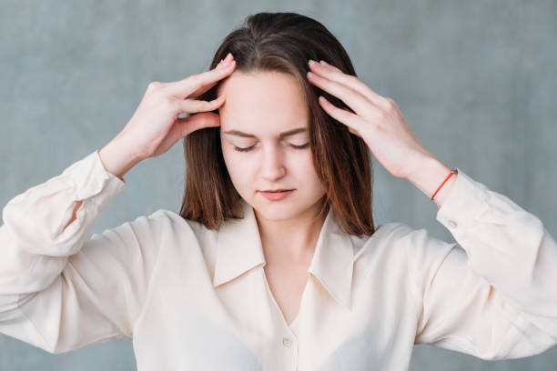 istock concerned professional concentration young woman 1130633946