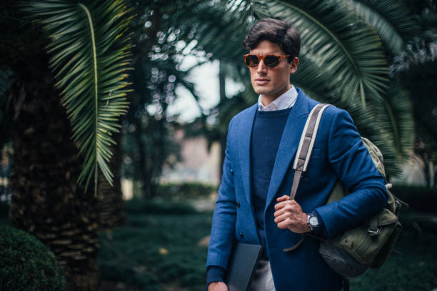 istock Stylish businessman at the park 1130635085