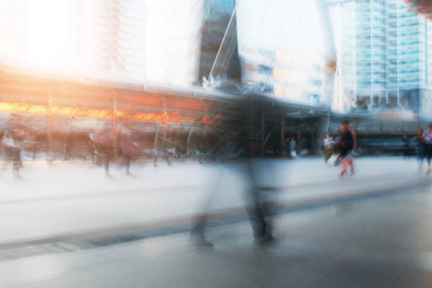 istock People walking with blurred images. 1130635256