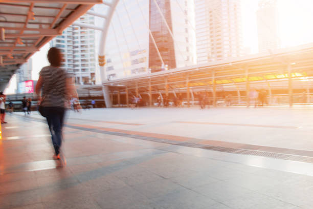 istock People in city with blurred images. 1130635266