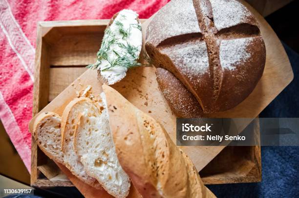 Sliced Baguette And Round Rye Black Bread Sandwich With Bread Butter And  Dill White Loaf And Rye Bread Close Up And Copy Space Stock Photo -  Download Image Now - iStock