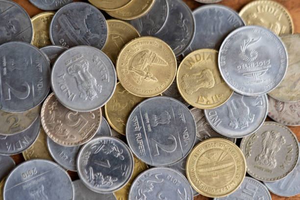 istock Indian Currency Coins Background 1130639174