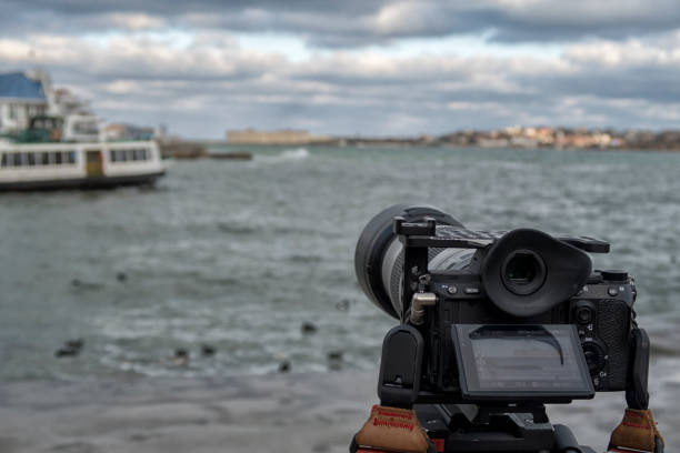istock Video cameraman working with his professional equipment. 1130640105