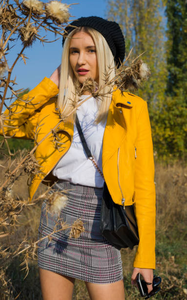 istock Beautiful elegant woman autumn park 1130640543