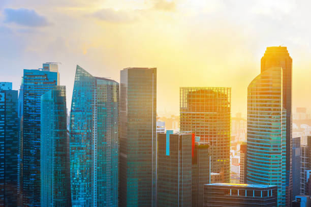 istock Singapore skyscrapers in backlit sunset 1130642662