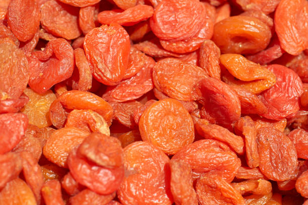 istock Dried apricots close-up, texture and background 1130643193