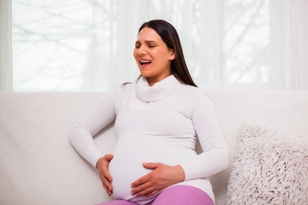 istock Pregnant woman at home 1130645650