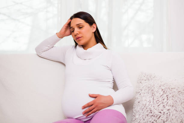 istock Pregnant woman at home 1130645699