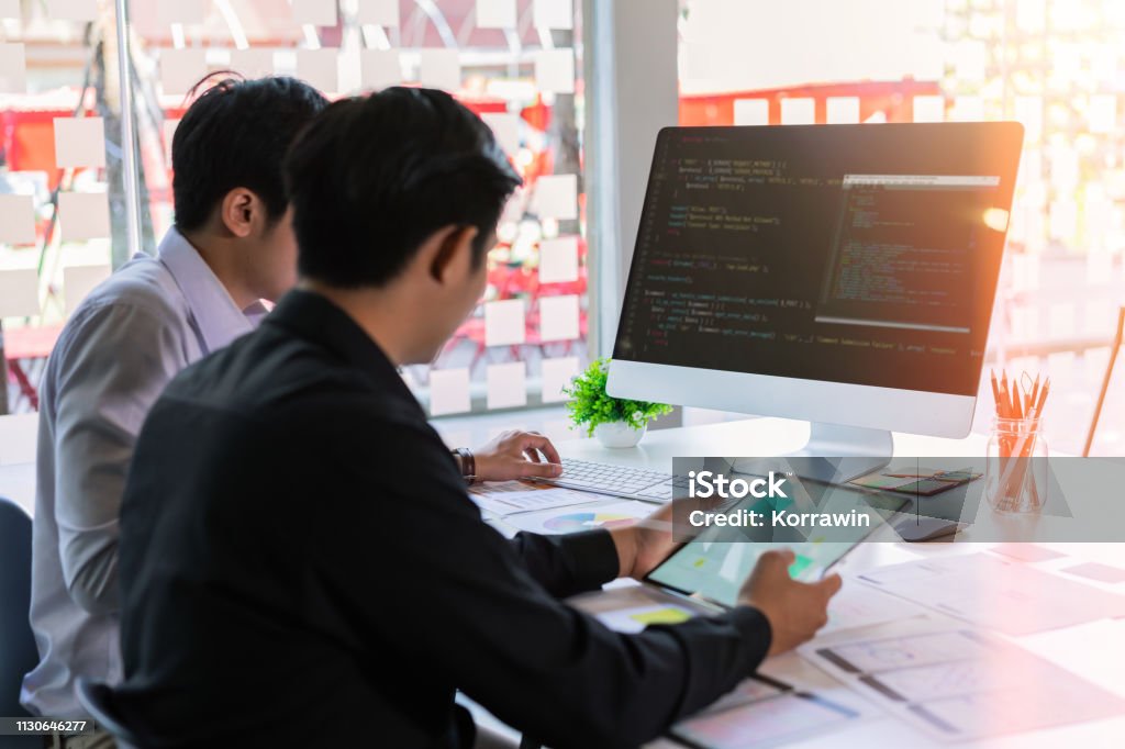 Attractive Two Young Programmers Team Developing Programming And Coding ...