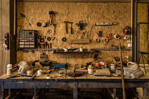 Carpentry work tools on workbench with no people.